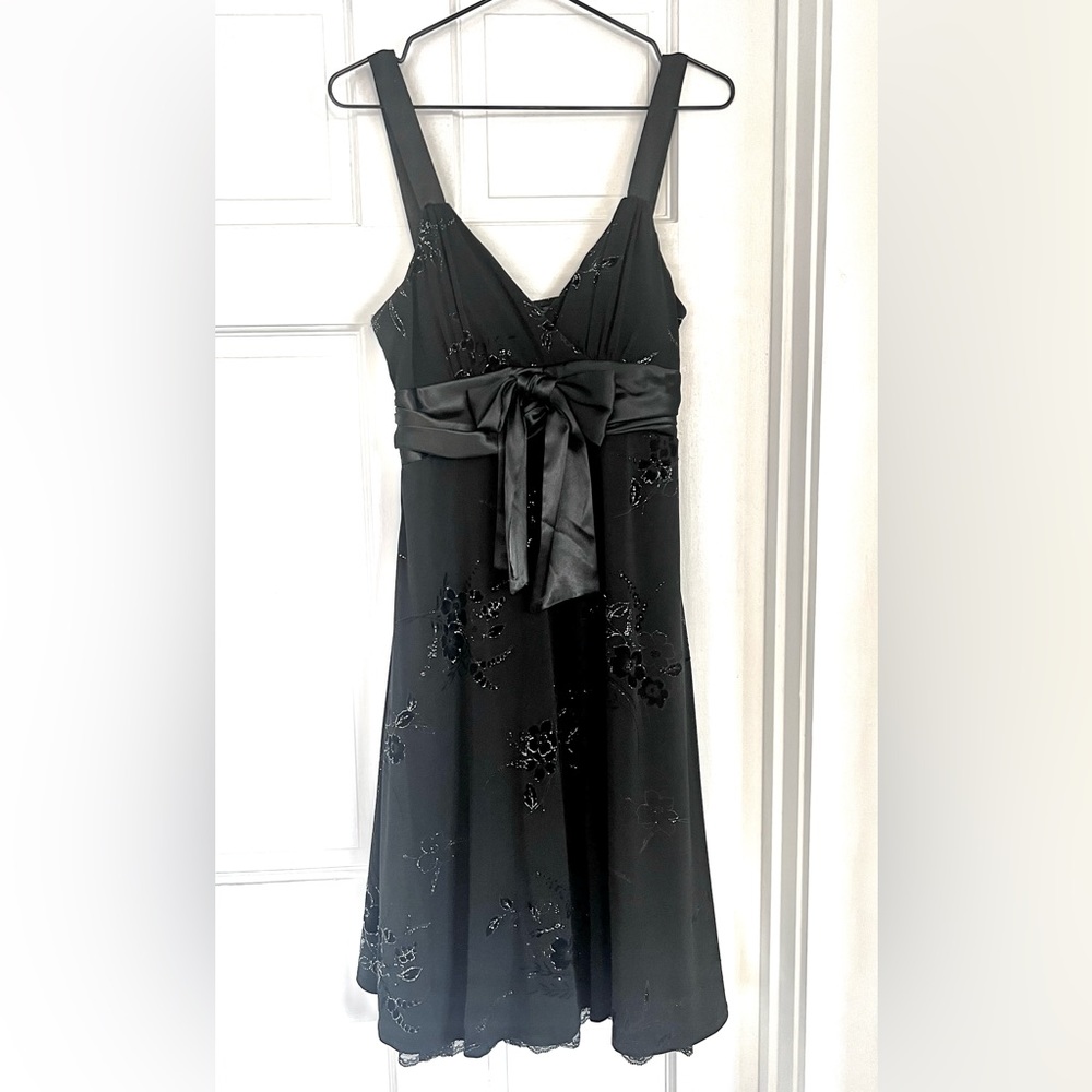 City Triangles Size L - black dress with silver sparkles, bow, and floral design